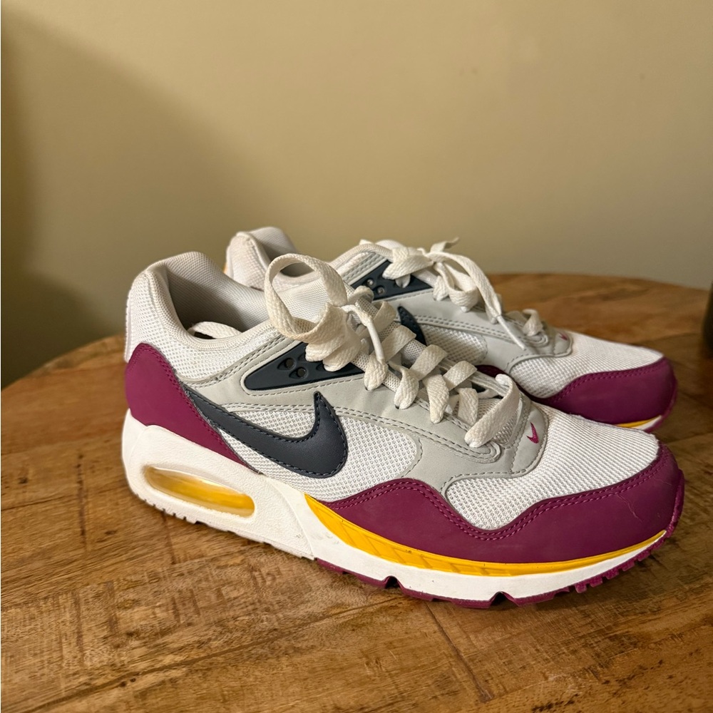 Nike White and Pink Sneakers with Yellow Accents